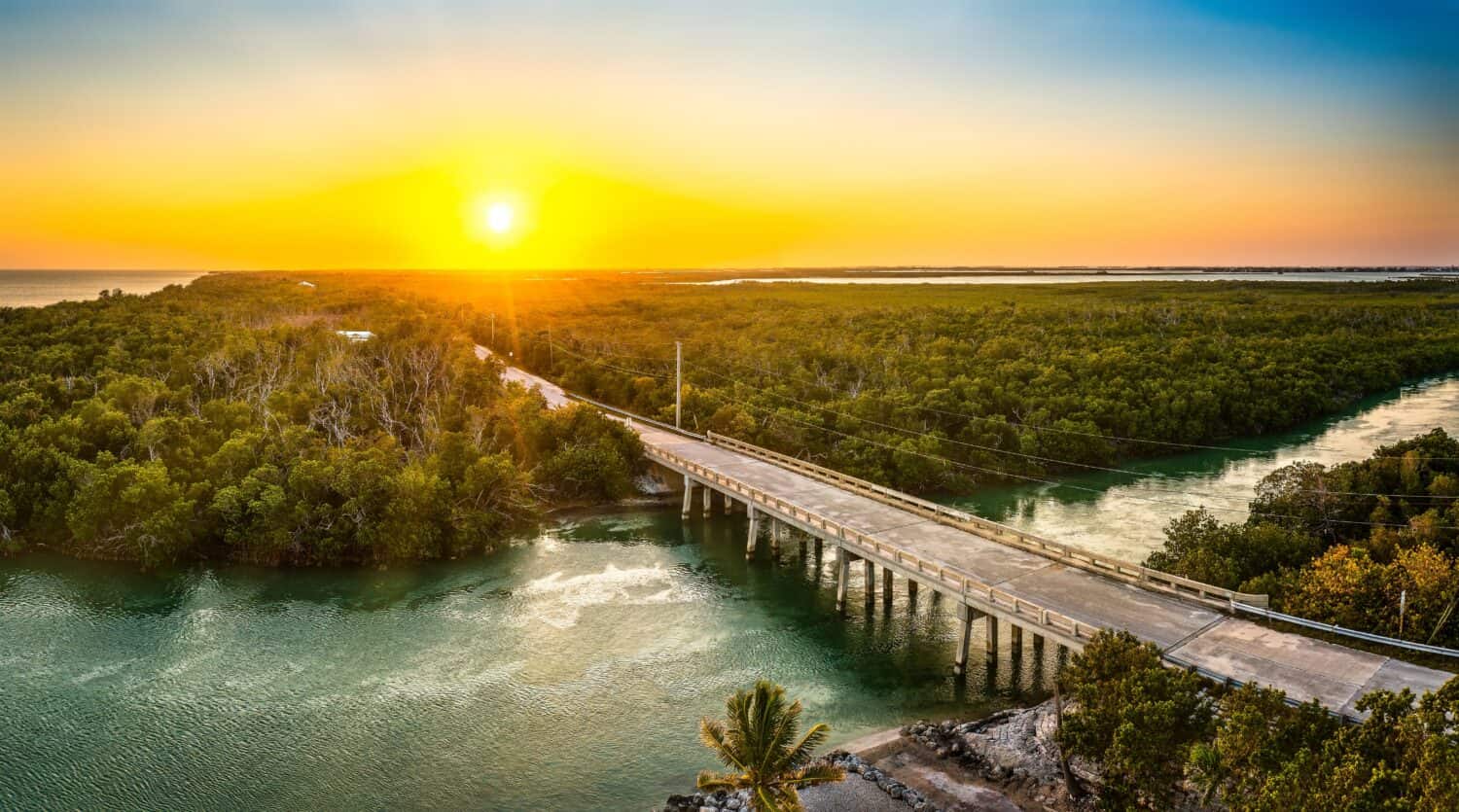 Aerial sunset with the bridge between Sugarloaf and Saddlebunch Keys, above Sugarloaf Creek, in Florida Keys, Florida.
