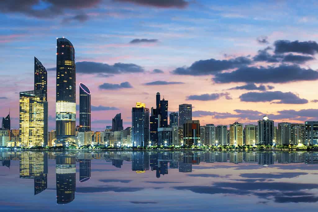 View of Abu Dhabi Skyline at sunset, United Arab Emirates- one of the world's 40 cities that could be underwater by 2050