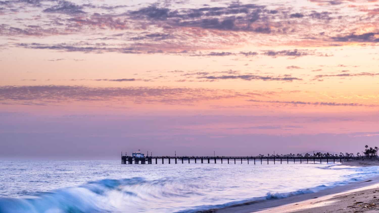 Balboa Pier and Newport Beach in California, home to some of the largest waves in the United States.