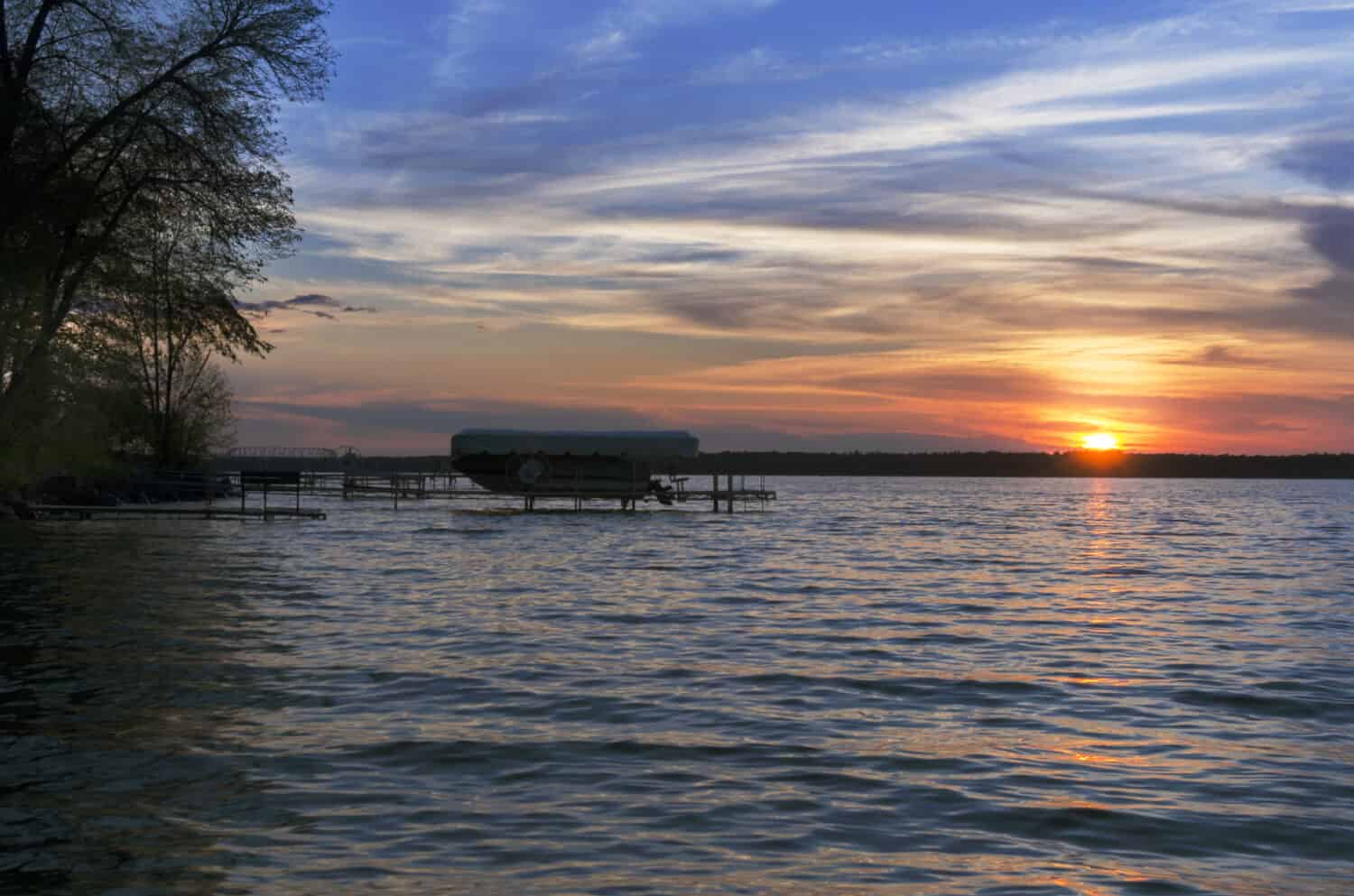 Sunset With A Single Boat Over Leech Lake, Minnesota United States
