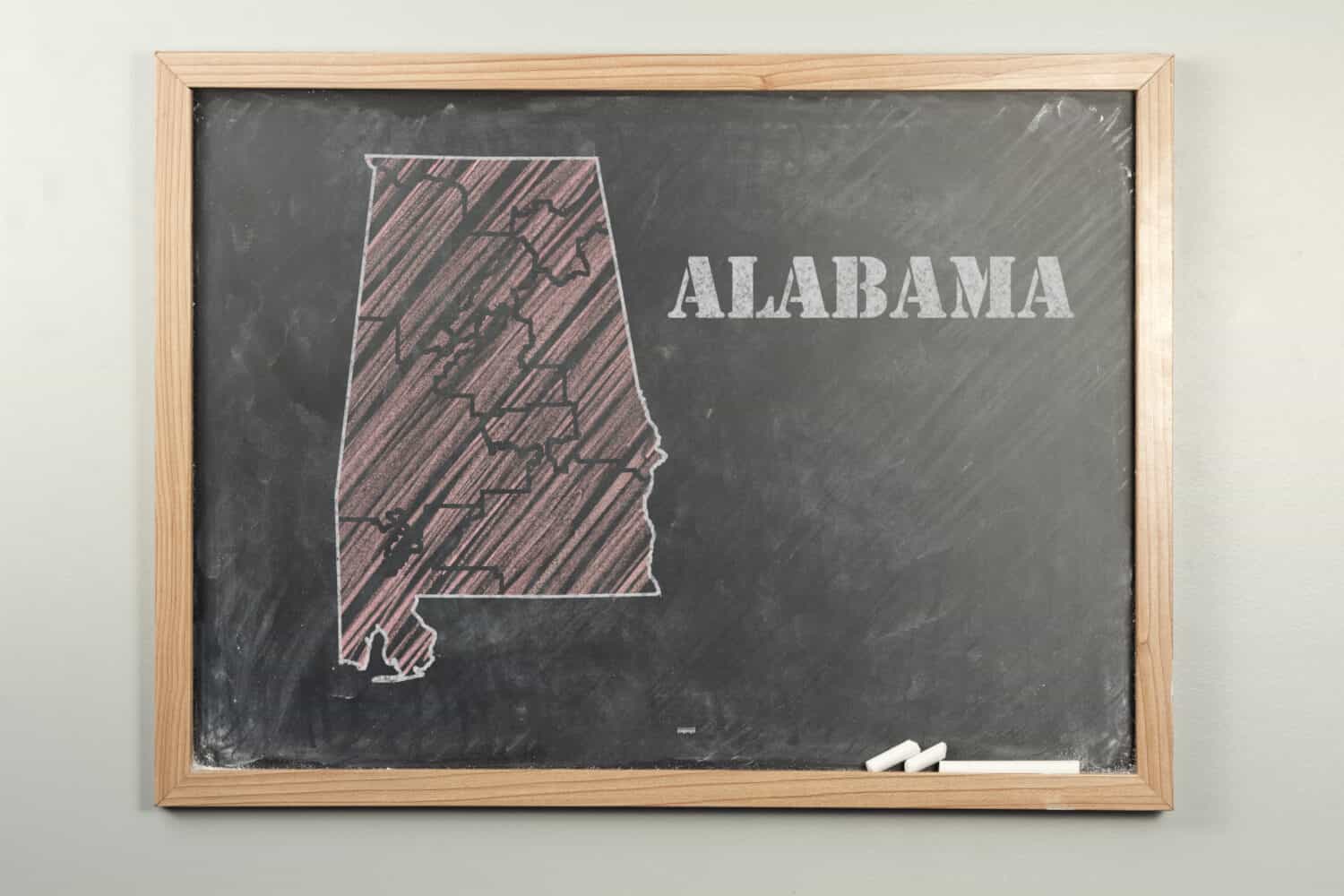  A map of Alabama on  Grade school chalkboard. 