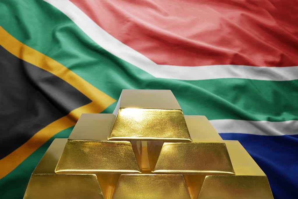 shining golden bullions on the south africa flag background