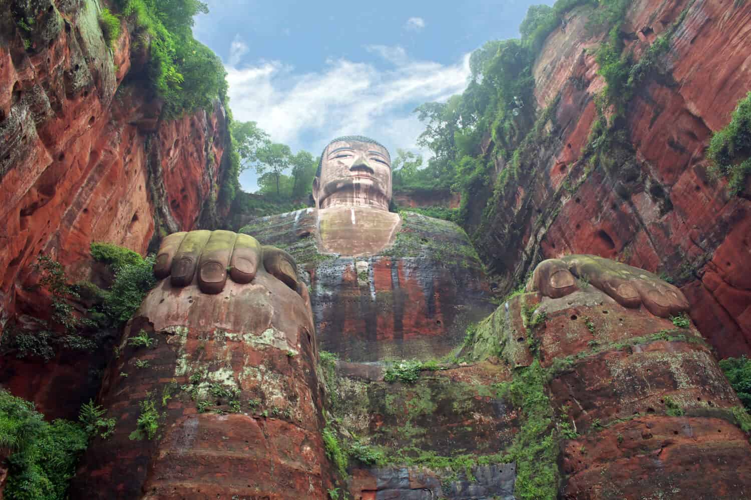  Leshan Grand Buddha is a famous cultural and historical spot in Sichuan Leshan, China, which is the world's biggest stone sitting buddha statue