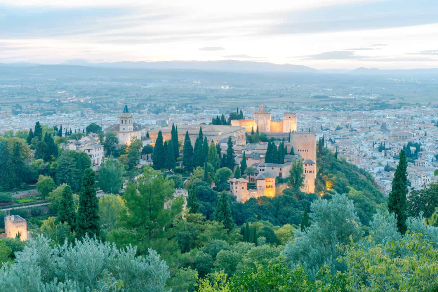 Walls and towers of the fortress of the Alhambra at sunset in Granada. Andalusia. Spain.