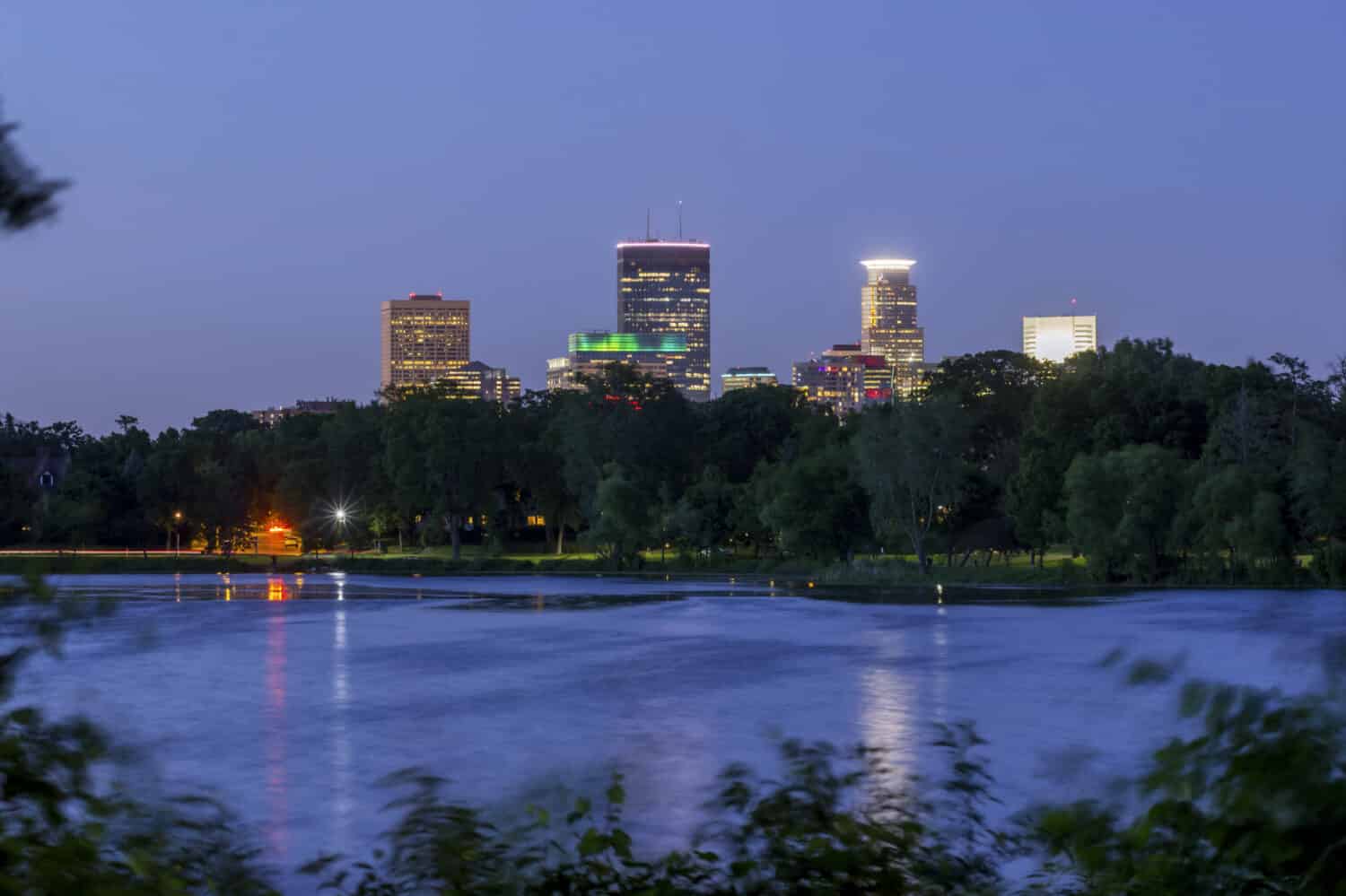 A Tight Long Exposure Shot of the Minneapolis Skyline over Cedar Lake on a Windy Spring Twilight