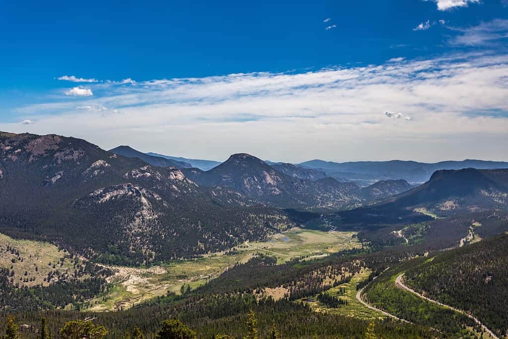 Trail Ridge Road is the name for a stretch of U.S. Highway 34 that traverses Rocky Mountain National Park from Estes Park, Colorado to Grand Lake, Colorado offering stunning mountain views.