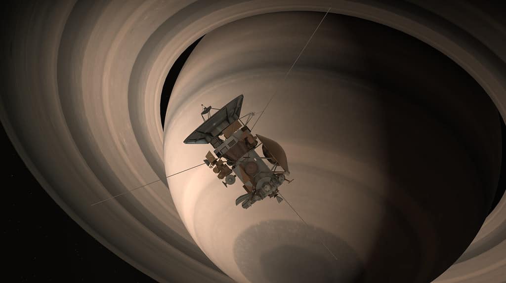 Satellite Cassini is approaching Saturn. Cassini Huygens is an unmanned spacecraft sent to the planet Saturn. Elements of this photo furnished by NASA.