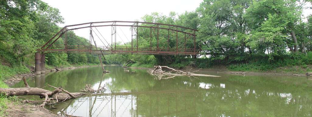 Facing west, a panorama view of the Parker through truss bridge that once carried Tarter Ferry Road over the Spoon River.