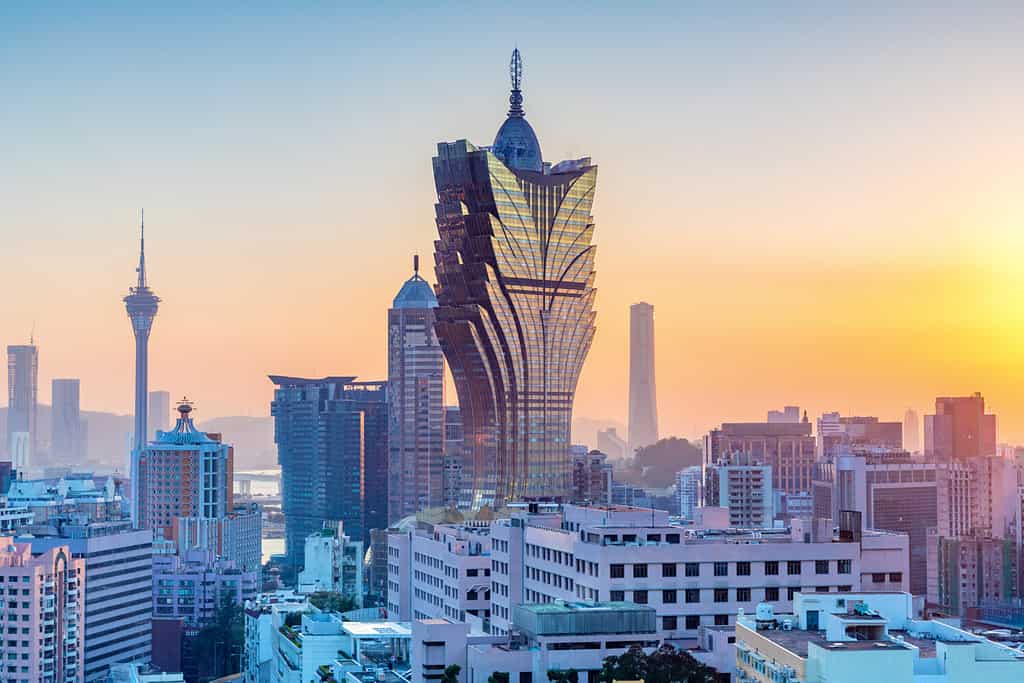 Macau, city skyline at sunset.