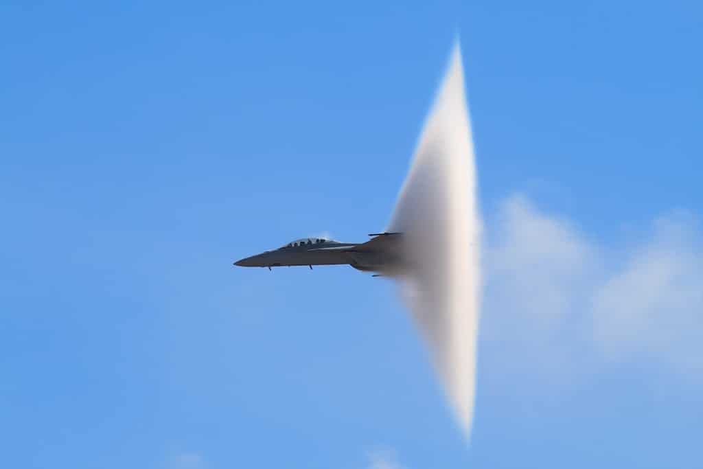 F-18 Super Hornet Vapor Cone - A distinctive vapor cone forms around the jet as it nears the speed of sound, otherwise known as the Prandtl-Glauert Singularity.