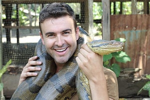Watch a Gargantuan Snake Attack Its Handler Who Needs Help to Escape Picture