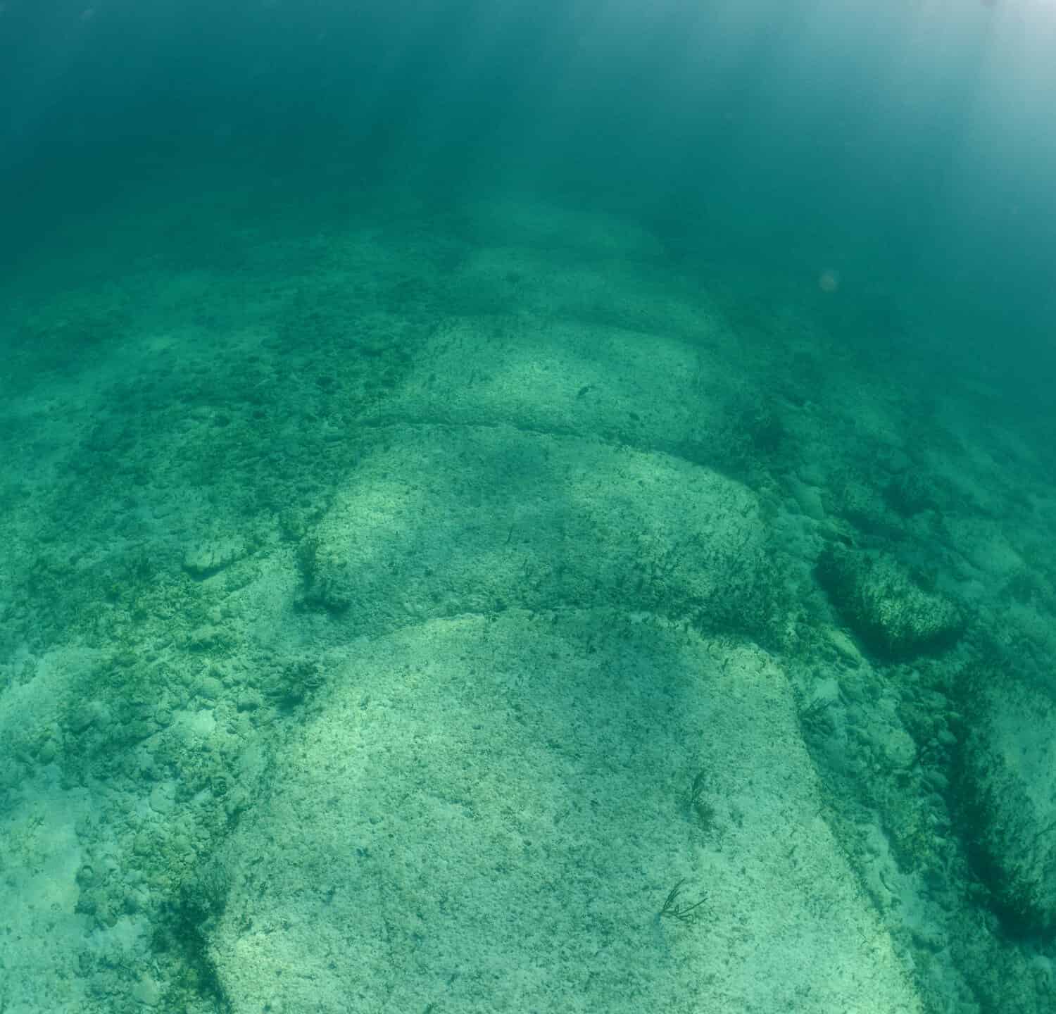 Underwater rock formation in the Bahamas named Bimini Road that is thought by some to be remnants of Atlantis