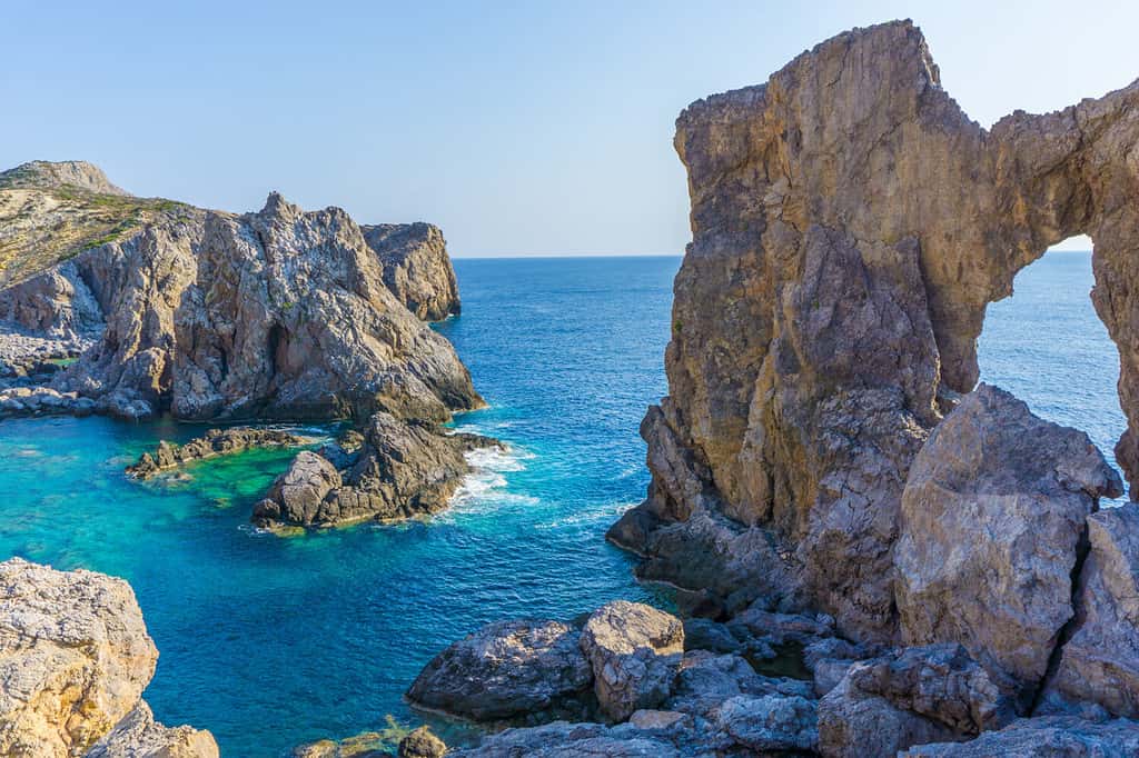 Kamarela a wild rocky beach with beautiful rocks complex and turquoise sea waters in Antikythera island in Greece