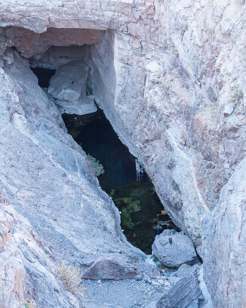 USA, Nevada, Nye County, Death Valley National Park, Devil's Hole. A small entrance to an large underground lake Home to the only population of the endangered species the Devil's Hole Pupfish