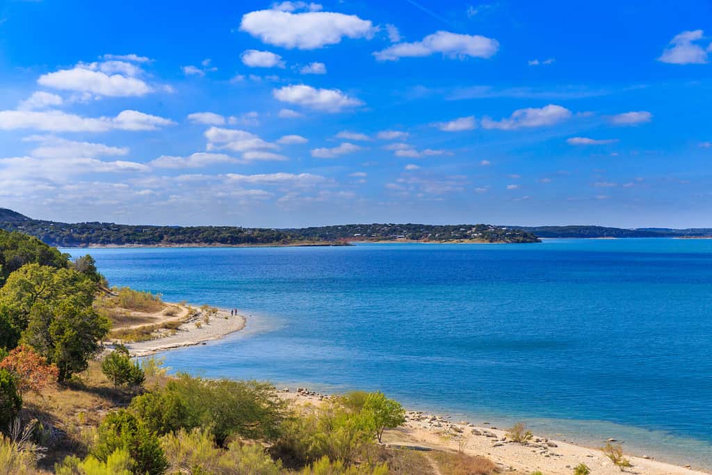 Canyon Lake close to San Antonio, New Braunfels, San Marcos and Wimberley in the Texas hill country. It is part of the Guadalupe River. You can walk on the dam. There are many beaches on the shores.