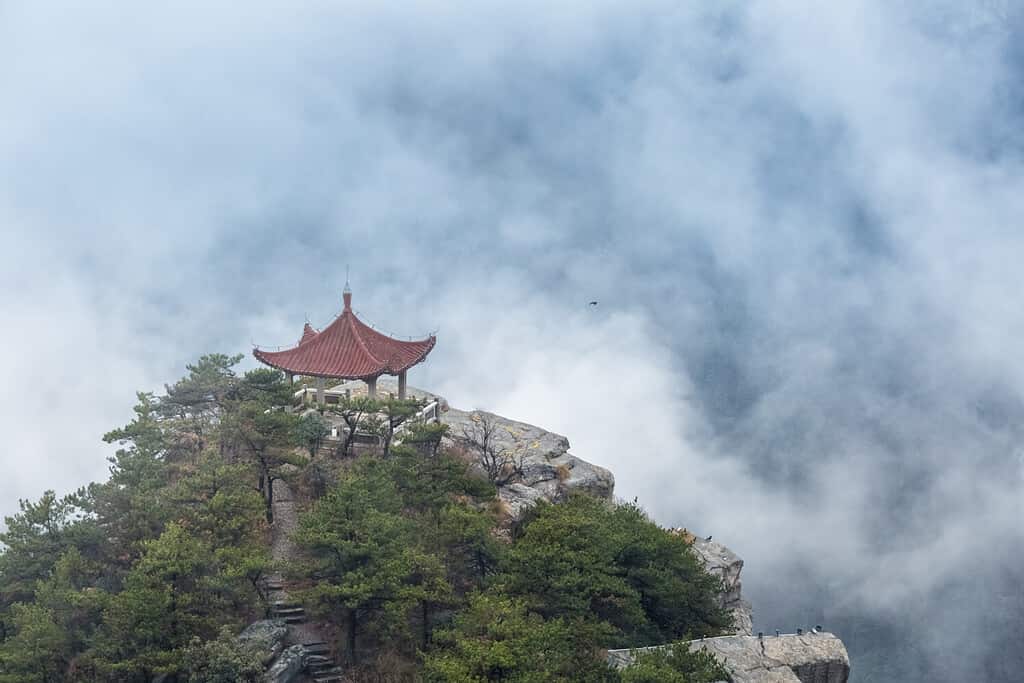 lushan mountain landscape, watching clouds pavilion closeup in cloud fog, a famous tourist destination in China.