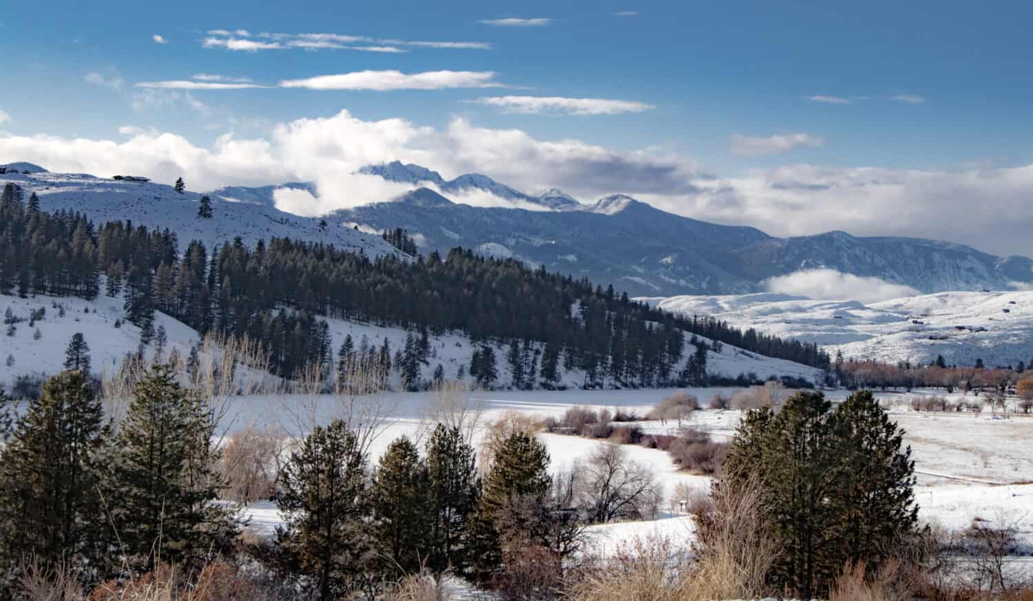 Wild West Winter Wilderness: Frozen Pearrygin Lake and Mountains in North Cascades National Park in Distance - Methow Valley, Washington, USA