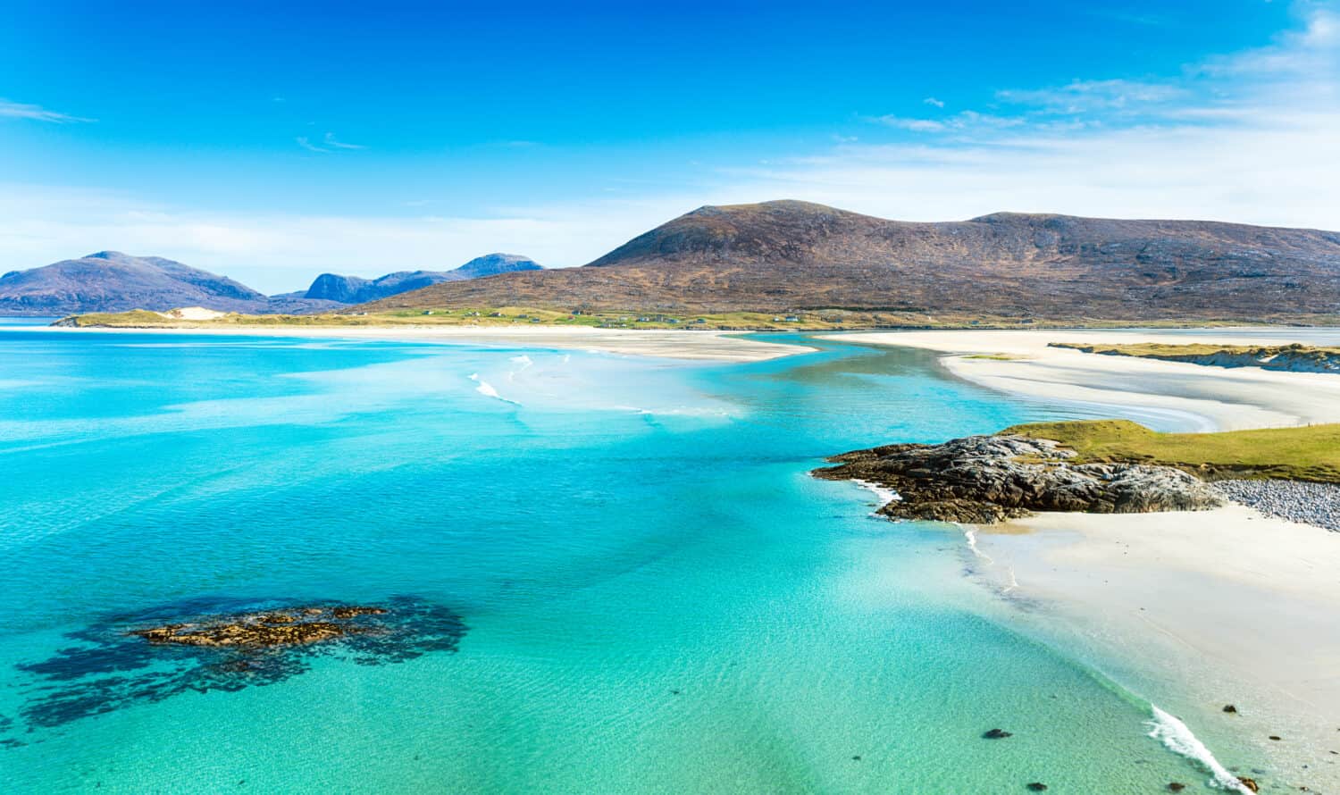 Sunny morning view of sandy beaches and Luskentyre from Seilebost, Isle of Harris, Scotland