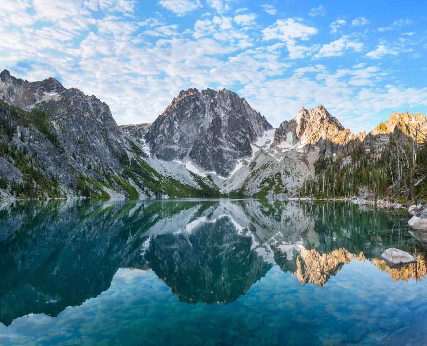 Sunrise Illuminates Dragontail Peak, Colchuck Peak and Asgaard Pass Above the Torquise Waters Of Colchuck Lake. The Enchantments, Cascade Mountains, Washington