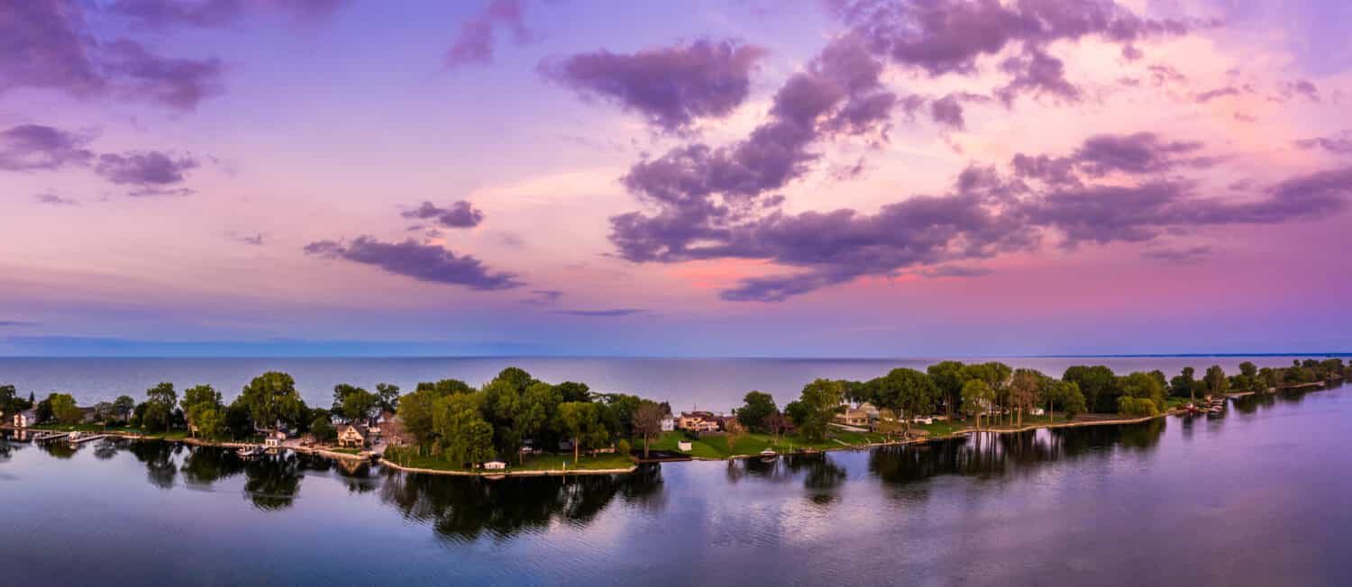 Aerial panorama of the Cedar Point peninsula at dusk, in Sandusky, Ohio, on the Erie lake.