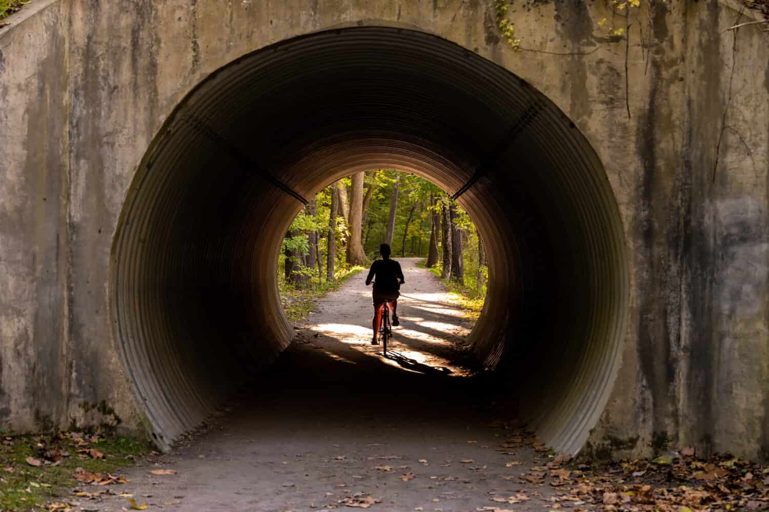 Woman Bikes Through Tunnel on Towpath in Cuyahoga Valley National Park