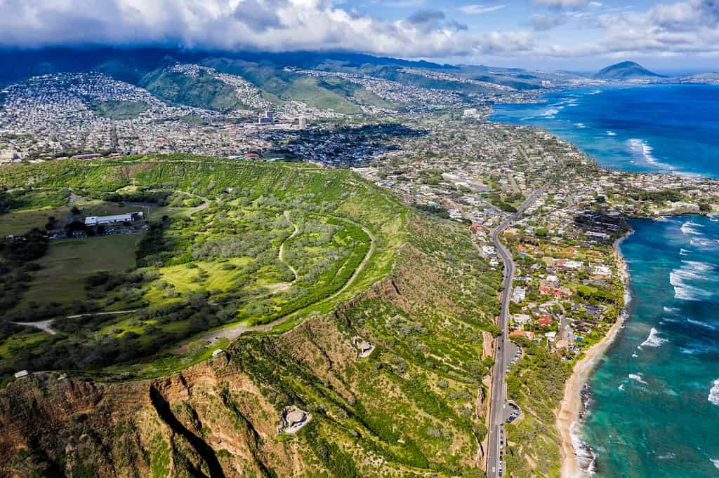 Road by the Diamond Head Mountain landmark and Honolulu suburbs, Oahu Hawaii