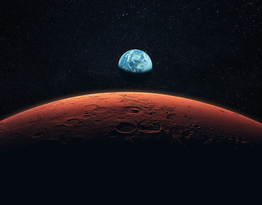 Mars, the red planet with detailed surface features and craters in deep space. Blue Earth planet in outer space. mars and earth, concept