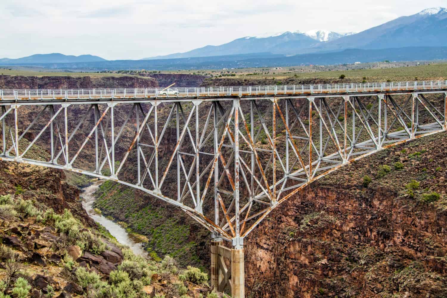 The Rio Grande Gorge Bridge-a steel deck arch bridge across the Rio Grande Gorge 10 miles) northwest of Taos NM United States.- the tenth highest bridge in the USA