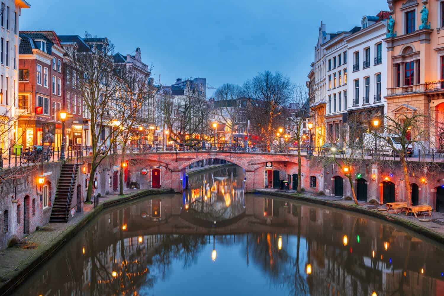 Utrecht, Netherlands canals and cityscape at twilight.