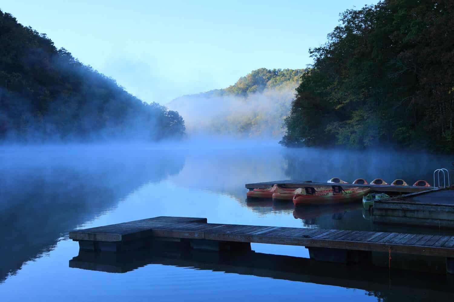 Dawn breaks on a cold and misty autumn morning at Hungry Mother State Park in Marion, Virginia.