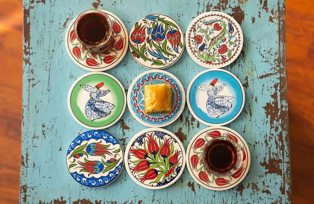 Photograph of Turkish Baklava in Ottoman Tile Turkish Coffee Cup and Turkish Tea Concept, Uskudar Istanbul, Turkey