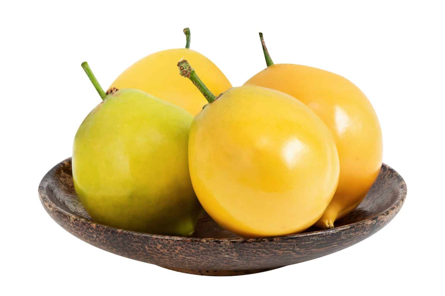 Garcinia or Garcinia dulcis fruits isolated on white with clipping path.