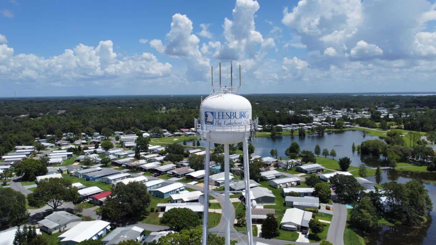 LEESBURG, US -Jul 23, 2022: An aerial shot of the water tower in Leesburg, Florida under the clouds.  One of the least hurricane-prone places in Florida 