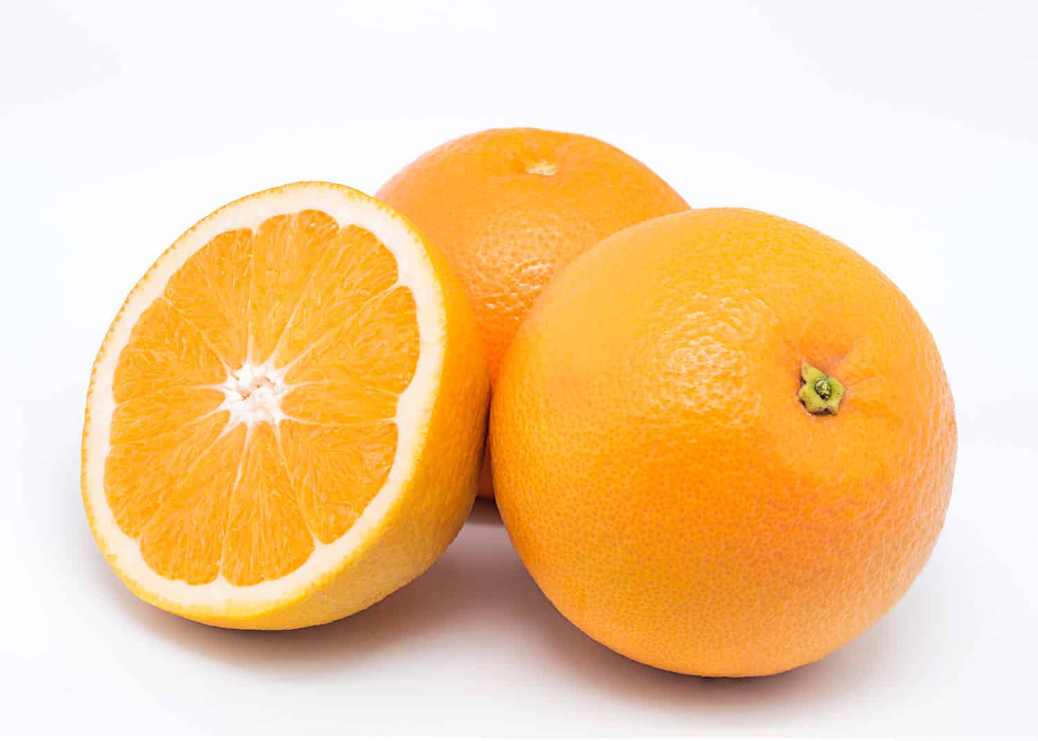 Valencia oranges on white background