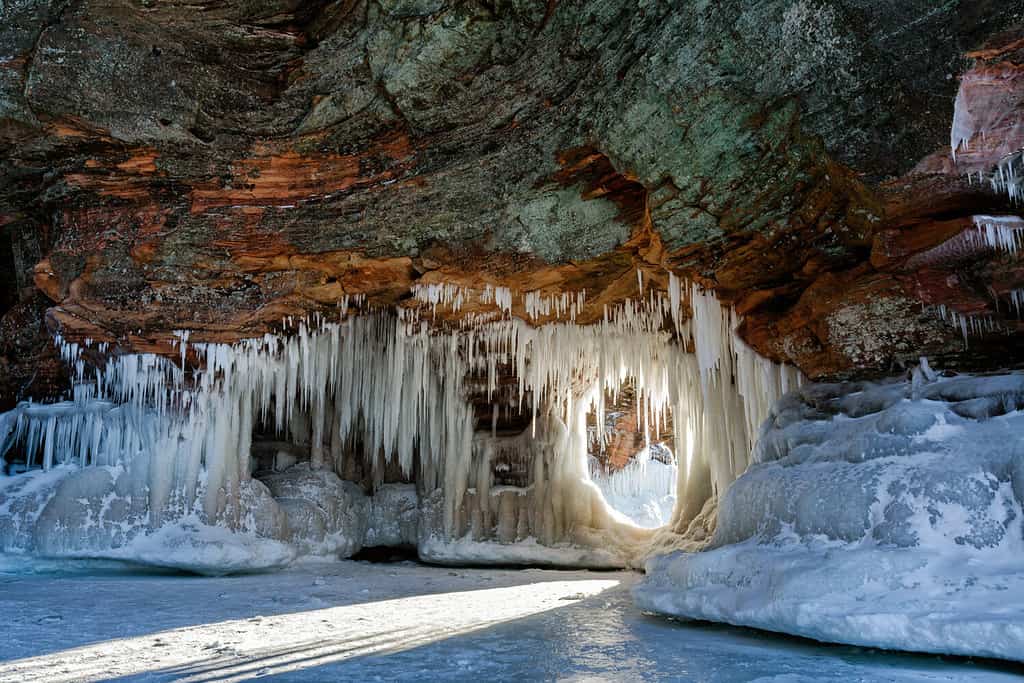 Icicle and snow-laden shoreline sandstone formations on Wisconsin's Apostle Islands National Lakeshore near Meyer's beach; Lake Superior.