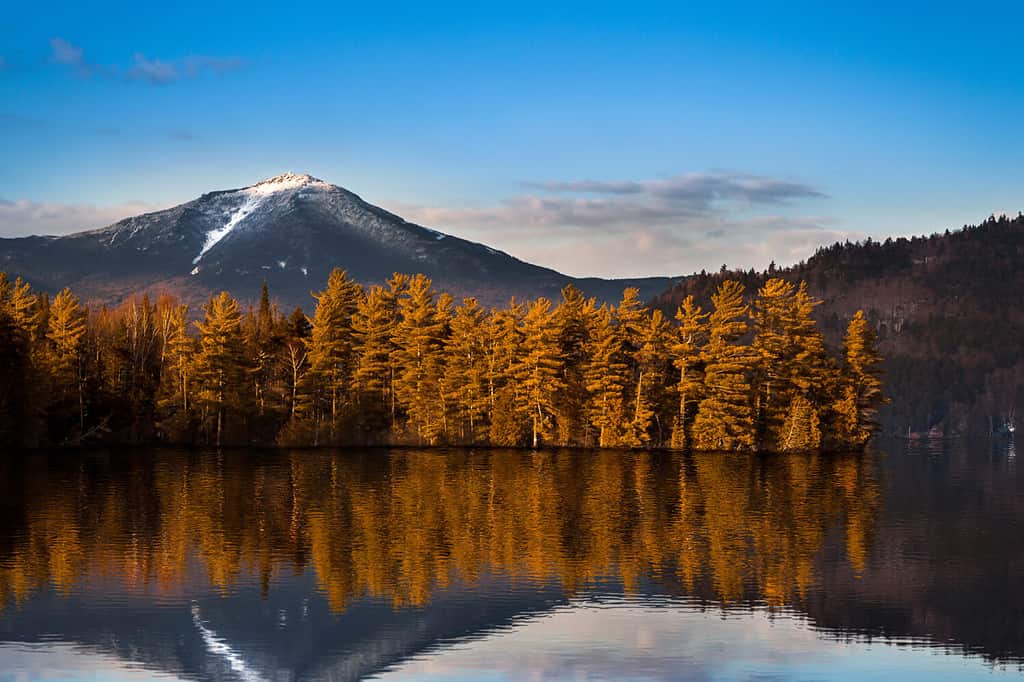 Snowy Whiteface mountain with reflections in Paradox Bay, Lake Placid, Upstate New York