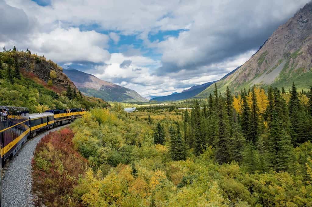 Alaska railroad traveling through beautiful autumn landscape and mountains