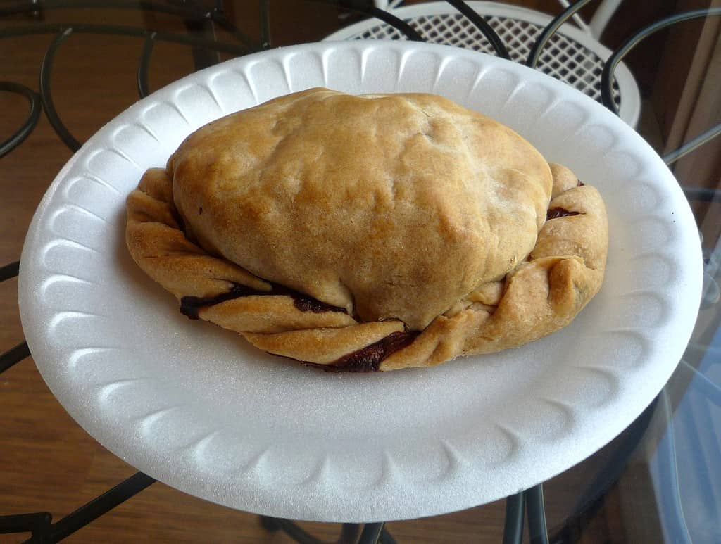 A traditional Yooper pasty (whole and a cross section; a beef pasty). Picked up from Muldoons Pasties, Munising, Michigan, USA.Date	