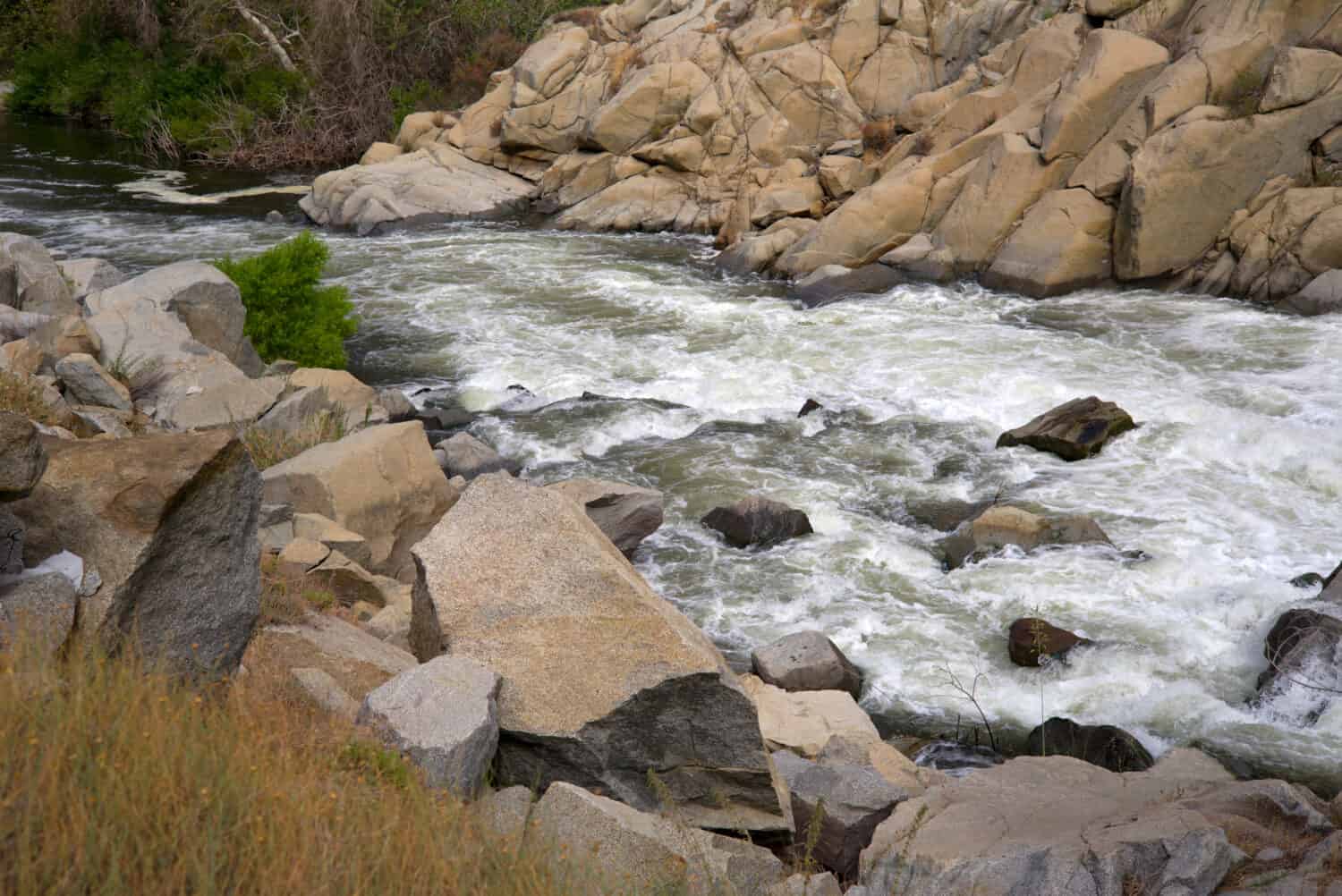 The Kern River, a tourist and recreational attraction, turns wild and treacherous at this point, a danger to swimmers and boaters alike.