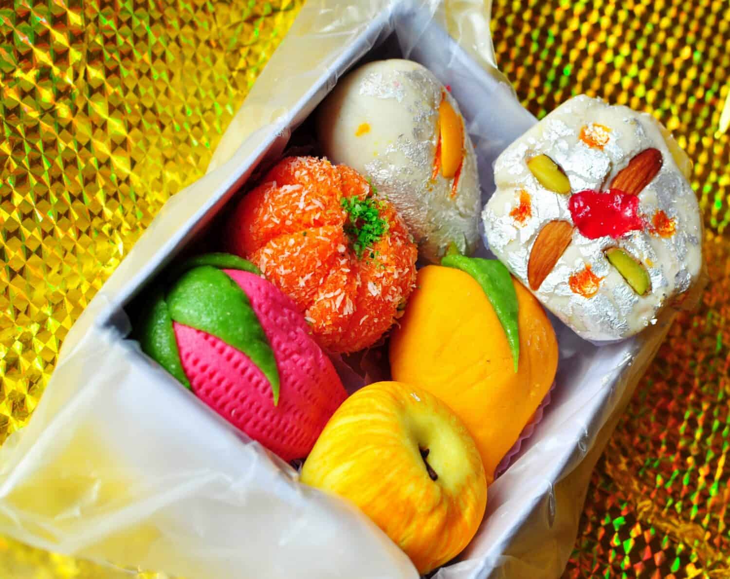 Diwali mithai, Box of colorful sweets made of milk, sugar and nuts.