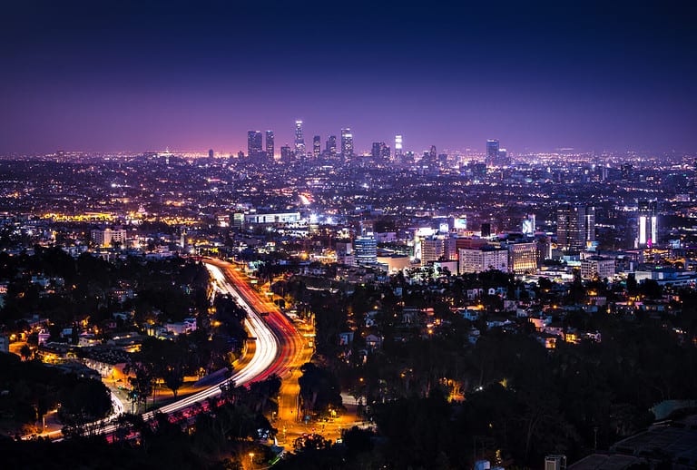 View of Downtown Los Angeles from the Hollywood Hills. Interstate 101 is shown in the foreground.
