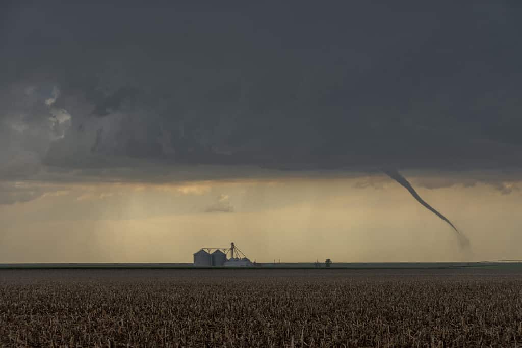 St Francis, Kansas, USA - June 29th, 2019: Tornado next to a silo