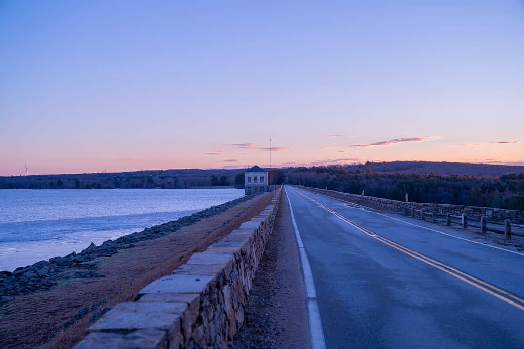 Sunrise at Scituate reservoir in winter