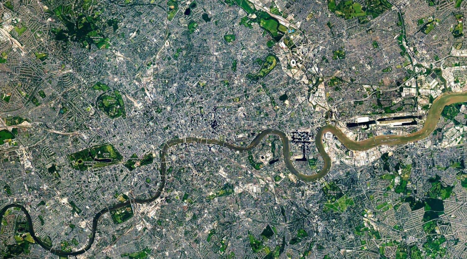 Top view of London, the Capital city from space, London map, Aerial view of Hyde Park, Buckingham Palace, Kensington Gardens, River Thames, grids. Elements of this image furnished by NASA.