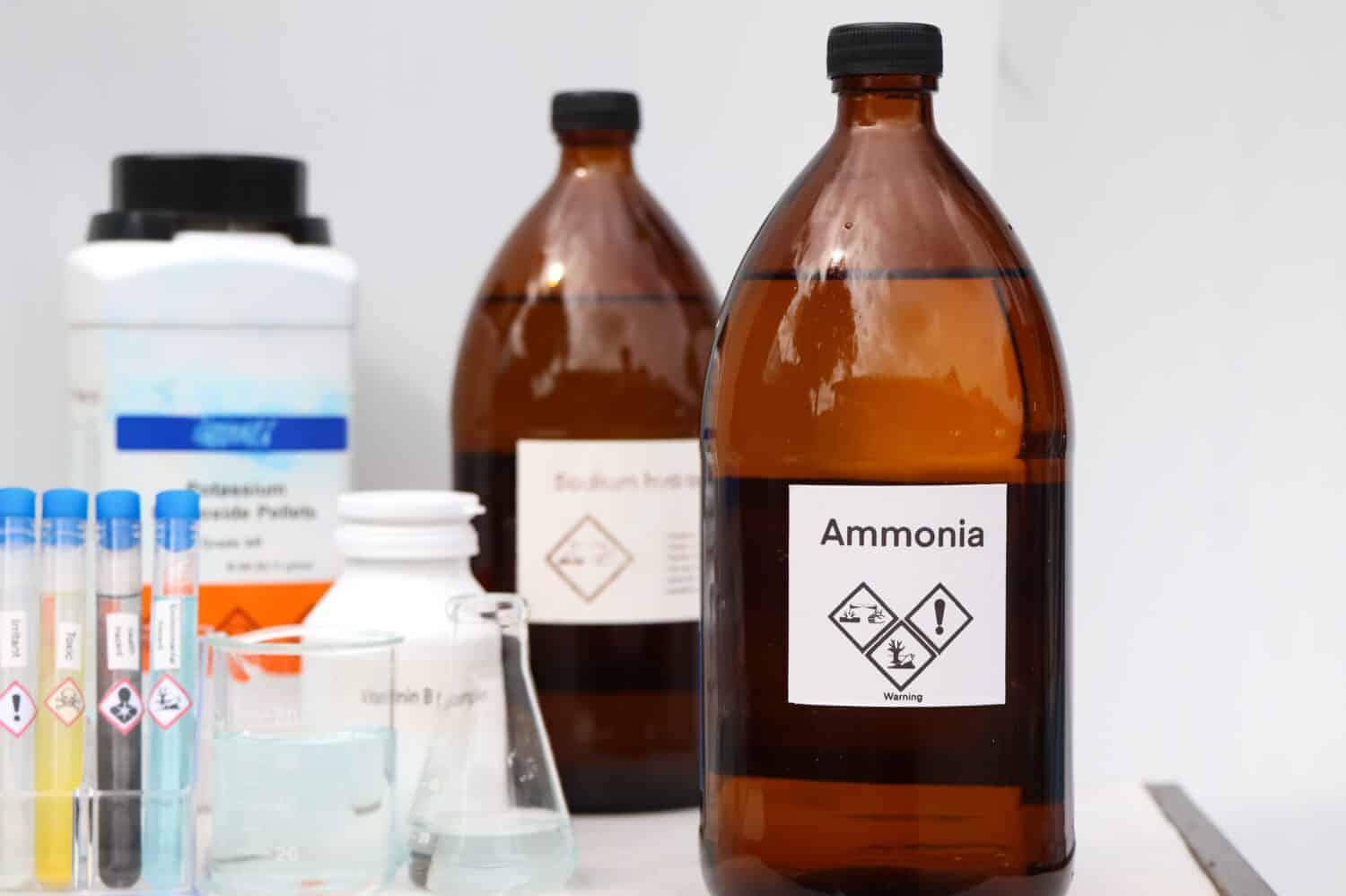 Ammonia in bottle, chemical in the laboratory and industry
