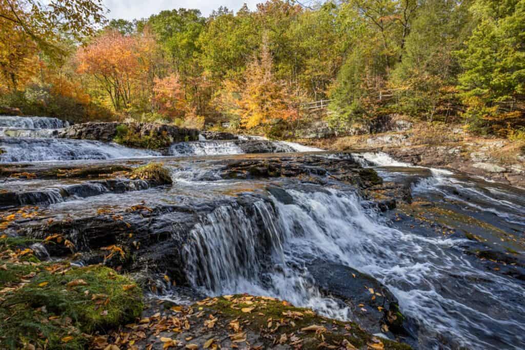 Shohola Falls in the Poconos, PA, looks amazing with beautiful fall foliage and lots of graceful cascades