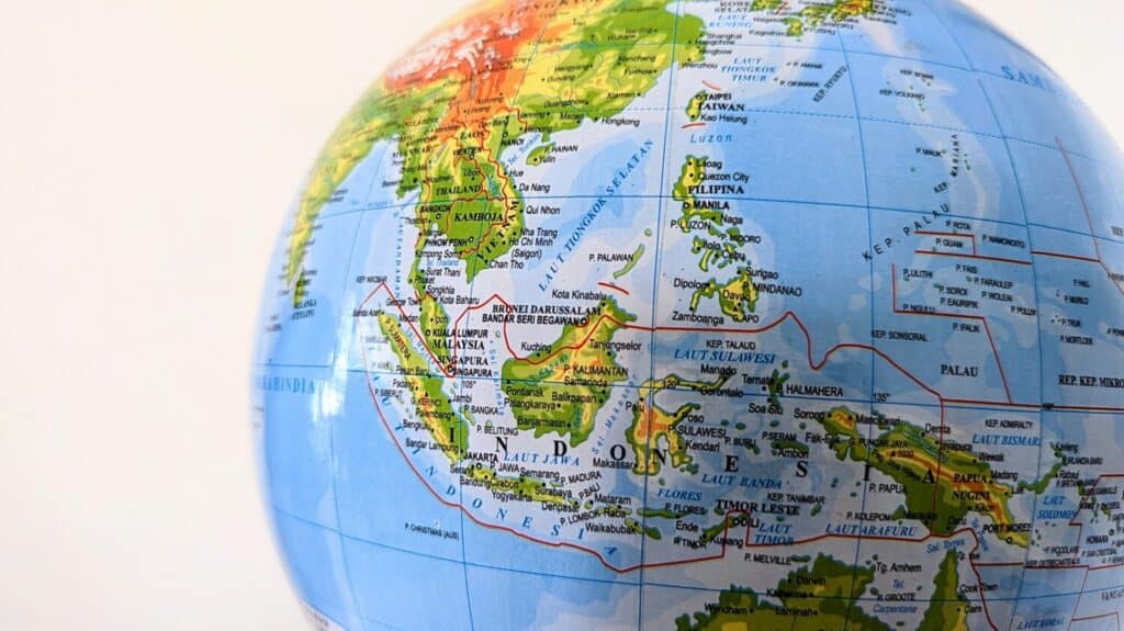 Part of a world globe showing Southeast Asia