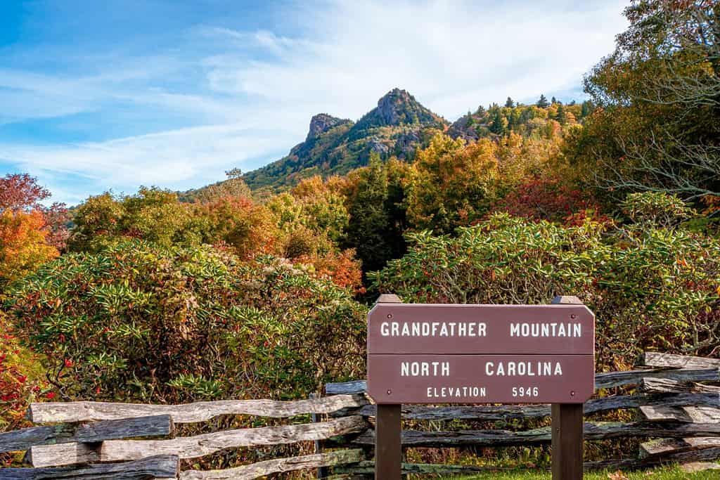 Grandfather Mountain State park in fall season. Grandfather Mountain is a mountain near Linville, North Carolina. At 5,946 feet, it is the highest peak on the eastern of the Blue Ridge Mountains.