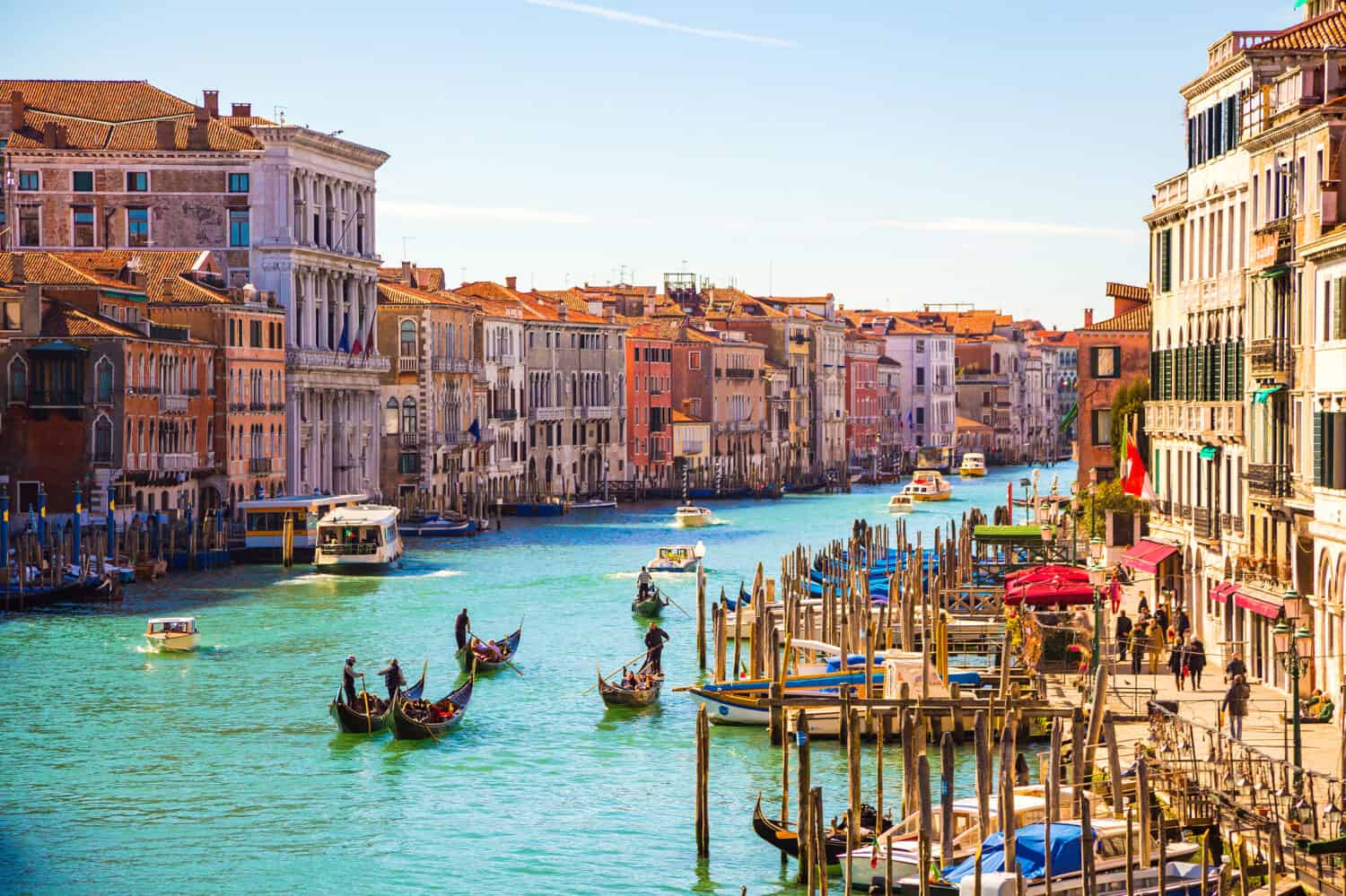 Amazing view on the beautiful Venice, Italy. Many gondolas sailing down one of the canals.