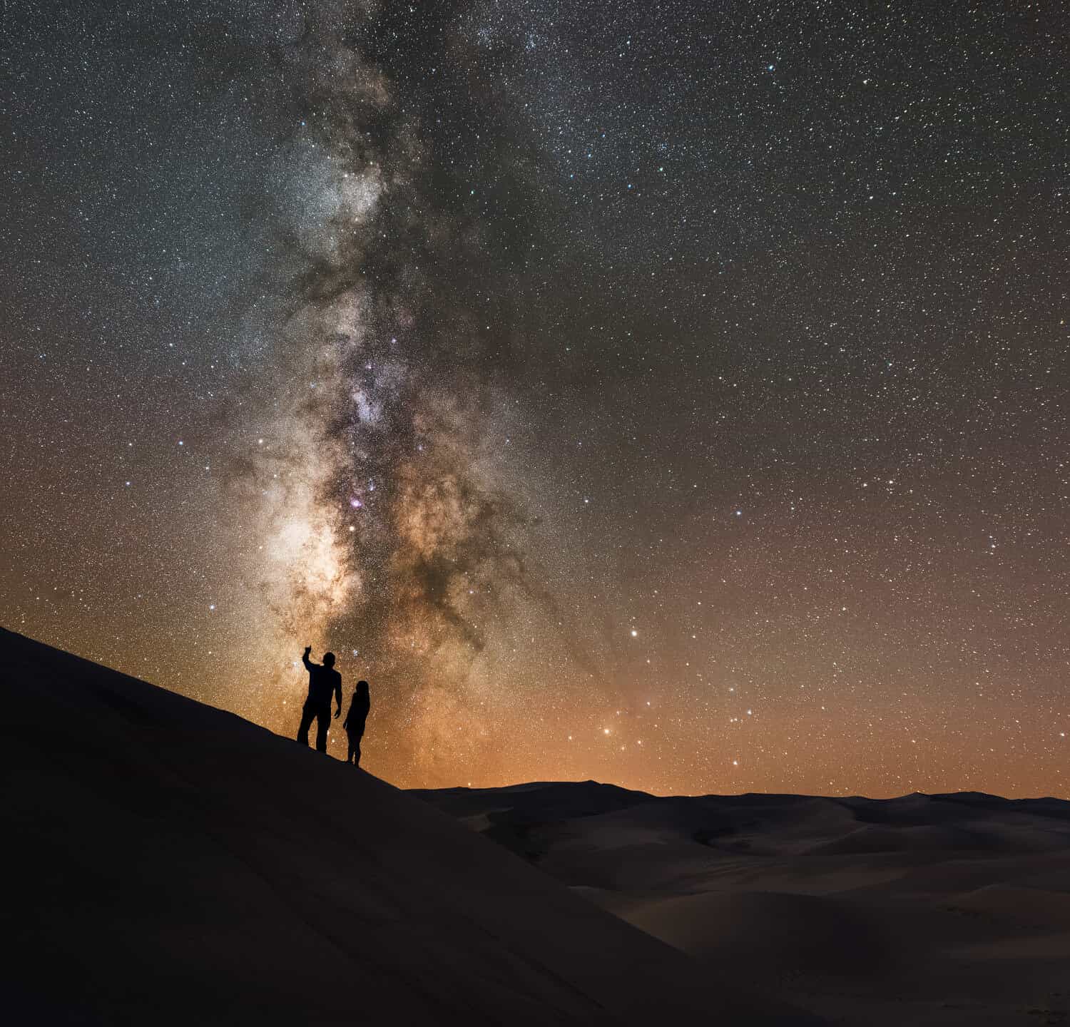 Stargazers at Great Sand Dunes National Park looking at the Milky Way Galaxy.